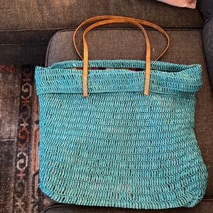 Rattan beach/ tote bag with long shoulder straps.